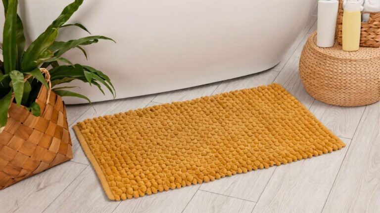 These bathroom mat choices trap moisture and stink fast
